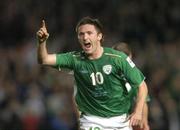13 October 2004; Robbie Keane, Republic of Ireland, celebrates after scoring his sides second goal. With this goal he increases his all time Irish record to 23 international goals. FIFA 2006 World Cup Qualifier, Republic of Ireland v Faroe Islands, Lansdowne Road, Dublin. Picture credit; Brian Lawless / SPORTSFILE