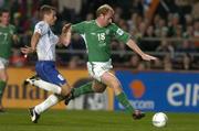 13 October 2004; Gary Doherty, Republic of Ireland, in action against Jakup a Borg, Faroe Islands. FIFA 2006 World Cup Qualifier, Republic of Ireland v Faroe Islands, Lansdowne Road, Dublin. Picture credit; Brian Lawless / SPORTSFILE