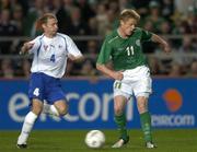 13 October 2004; Damien Duff, Republic of Ireland, in action against Pol Thorsteinsson, Faroe Islands. FIFA 2006 World Cup Qualifier, Republic of Ireland v Faroe Islands, Lansdowne Road, Dublin. Picture credit; Brian Lawless / SPORTSFILE