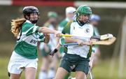 15 October 2004; Therese Maher, Ireland, right, in action against Sinead Everard, Britain. 2004 Coca Cola International Camogie Competition, Ireland v Britain, St. Brigids GAA Club, Dublin. Picture credit; Matt Browne / SPORTSFILE