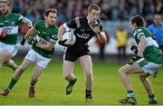 20 October 2013; Paul Kingston, Arles - Killeen, in action against Brian Mulligan, left, and David Seale, Portlaoise. Laois County Senior Club Football Championship Final, Portlaoise v Arles - Killeen, O'Moore Park, Portlaoise, Co. Laois. Picture credit: Barry Cregg / SPORTSFILE