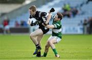20 October 2013; Paul Kingston, Arles - Killeen, in action against Brian Mulligan, Portlaoise. Laois County Senior Club Football Championship Final, Portlaoise v Arles - Killeen, O'Moore Park, Portlaoise, Co. Laois. Picture credit: Barry Cregg / SPORTSFILE