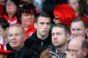 20 October 2013; Republic of Ireland International Seamus Coleman watches on from the stands during the Donegal County Senior Club Football Championship Final. Glenswilly v Killybegs, MacCumhaill Park, Ballybofey, Co. Donegal. Picture credit: David Maher / SPORTSFILE
