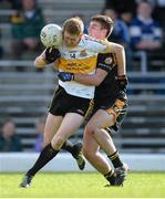 20 October 2013; Colm Cooper, Dr. Crokes, is tackled by Ferghal McNamara, Austin Stacks. Kerry County Senior Club Football Championship Final, Dr. Crokes v Austin Stacks, Fitzgerald Stadium, Killarney, Co. Kerry. Picture credit: Brendan Moran / SPORTSFILE