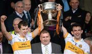 20 October 2013; Dr. Crokes captain Ambrose O'Donovan, right, and team-mate Michael Moloney lift the Bishop Moynihan Cup in the company of Patrick O'Sullivan, Chairman, Kerry County Board. Kerry County Senior Club Football Championship Final, Dr. Crokes v Austin Stacks, Fitzgerald Stadium, Killarney, Co. Kerry. Picture credit: Brendan Moran / SPORTSFILE
