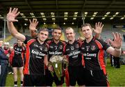 20 October 2013; Oulart-the-Ballagh players, from left, David Redmond, Keith Rossiter, team captain Darren Nolan and Paul Roche celebrate after winning Wexford County Senior Club Hurling Championship for the fifth time in a row. Wexford County Senior Club Hurling Championship Final, Oulart-the-Ballagh v Ferns St Aidan's, Wexford Park, Wexford. Picture credit: Matt Browne / SPORTSFILE