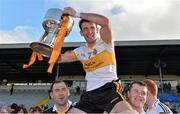 20 October 2013; Dr. Crokes captain Ambrose O'Donovan lifts the Bishop Moynihan Cup after the game. Kerry County Senior Club Football Championship Final, Dr. Crokes v Austin Stacks, Fitzgerald Stadium, Killarney, Co. Kerry. Picture credit: Brendan Moran / SPORTSFILE
