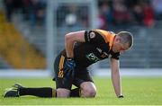 20 October 2013; Kieran Donaghy, Austin Stacks, holds his leg before receiving treatment during the first half. Kerry County Senior Club Football Championship Final, Dr. Crokes v Austin Stacks, Fitzgerald Stadium, Killarney, Co. Kerry. Picture credit: Brendan Moran / SPORTSFILE