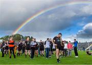 20 October 2013; The dejected Austin Stacks team, including midfielder Barry Shanahan, centre, stand under a rainbow during the cup presentation after the game. Kerry County Senior Club Football Championship Final, Dr. Crokes v Austin Stacks, Fitzgerald Stadium, Killarney, Co. Kerry. Picture credit: Brendan Moran / SPORTSFILE