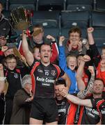 20 October 2013; Oulart-the-Ballagh captain Darren Nolan lifts the cup as his team-mates and supporters celebrate. Wexford County Senior Club Hurling Championship Final, Oulart-the-Ballagh v Ferns St Aidan's, Wexford Park, Wexford. Picture credit: Matt Browne / SPORTSFILE