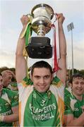 20 October 2013; Glenswilly captain James Pat McDaid celebrates with the cup at the end of the game. Donegal County Senior Club Football Championship Final, Glenswilly v Killybegs, MacCumhaill Park, Ballybofey, Co. Donegal. Picture credit: David Maher / SPORTSFILE