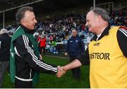 20 October 2013; Portlaoise joint-manager Mark Lillis shakes hands with Arles - Killeen manager Pat Ryan after the game. Laois County Senior Club Football Championship Final, Portlaoise v Arles - Killeen, O'Moore Park, Portlaoise, Co. Laois. Picture credit: Barry Cregg / SPORTSFILE
