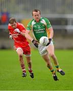 20 October 2013; Gary McFadden, Glenswilly, in action against Daniel Breslin, Killybegs. Donegal County Senior Club Football Championship Final, Glenswilly v Killybegs, MacCumhaill Park, Ballybofey, Co. Donegal. Picture credit: David Maher / SPORTSFILE
