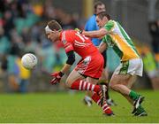 20 October 2013; Brendan Faherty, Killybegs, in action against Darren McGinley, Glenswillys. Donegal County Senior Club Football Championship Final, Glenswilly v Killybegs, MacCumhaill Park, Ballybofey, Co. Donegal. Picture credit: David Maher / SPORTSFILE