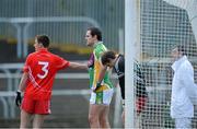 20 October 2013; Michael Murphy, Glenswilly, is held by Jason Noctor, Killybegs, as they wait for a free to be taken. Donegal County Senior Club Football Championship Final, Glenswilly v Killybegs, MacCumhaill Park, Ballybofey, Co. Donegal. Picture credit: David Maher / SPORTSFILE