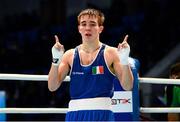 21 October 2013; Michael Conlan, St. John Bosco BC, Belfast, representing Ireland, celebrates after beating Brian Gonzalez, Mexico, in their Men's Bantamweight 56Kg Last 16 bout. AIBA World Boxing Championships Almaty 2013, Almaty, Kazakhstan. Photo by Sportsfile