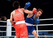 21 October 2013; Michael Conlan, St. John Bosco BC, Belfast, representing Ireland, right, exchanges punches with Brian Gonzalez, Mexico, during their Men's Bantamweight 56Kg Last 16 bout. AIBA World Boxing Championships Almaty 2013, Almaty, Kazakhstan. Photo by Sportsfile