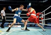 21 October 2013; Aston Brown, left, Scotland, exchanges punches with Jason Quigley, Finn Valley BC, Donegal, representing Ireland, during their Men's Middleweight 75Kg Last 16 bout. AIBA World Boxing Championships Almaty 2013, Almaty, Kazakhstan. Photo by Sportsfile