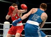 21 October 2013; Jason Quigley, left, Finn Valley BC, Donegal, representing Ireland, exchanges punches with Aston Brown, Scotland, during their Men's Middleweight 75Kg Last 16 bout. AIBA World Boxing Championships Almaty 2013, Almaty, Kazakhstan. Photo by Sportsfile