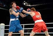 21 October 2013; Jason Quigley, right, Finn Valley BC, Donegal, representing Ireland, exchanges punches with Aston Brown, Scotland, during their Men's Middleweight 75Kg Last 16 bout. AIBA World Boxing Championships Almaty 2013, Almaty, Kazakhstan. Photo by Sportsfile