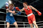 21 October 2013; Jason Quigley, right, Finn Valley BC, Donegal, representing Ireland, exchanges punches with Aston Brown, Scotland, during their Men's Middleweight 75Kg Last 16 bout. AIBA World Boxing Championships Almaty 2013, Almaty, Kazakhstan. Photo by Sportsfile