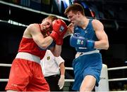 21 October 2013; Aston Brown, right, Scotland, exchanges punches with Jason Quigley, Finn Valley BC, Donegal, representing Ireland, during their Men's Middleweight 75Kg Last 16 bout. AIBA World Boxing Championships Almaty 2013, Almaty, Kazakhstan. Photo by Sportsfile