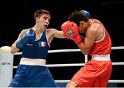21 October 2013; Michael Conlan, left, St. John Bosco BC, Belfast, representing Ireland, exchanges punches with Brian Gonzalez, Mexico, during their Men's Bantamweight 56Kg Last 16 bout. AIBA World Boxing Championships Almaty 2013, Almaty, Kazakhstan. Photo by Sportsfile