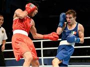 21 October 2013; Brian Gonzalez, left, Mexico, exchanges punches with Michael Conlan, St. John Bosco BC, Belfast, representing Ireland, during their Men's Bantamweight 56Kg Last 16 bout. AIBA World Boxing Championships Almaty 2013, Almaty, Kazakhstan. Photo by Sportsfile