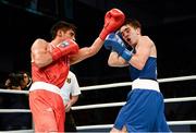 21 October 2013; Brian Gonzalez, left, Mexico, exchanges punches with Michael Conlan, St. John Bosco BC, Belfast, representing Ireland, during their Men's Bantamweight 56Kg Last 16 bout. AIBA World Boxing Championships Almaty 2013, Almaty, Kazakhstan. Photo by Sportsfile