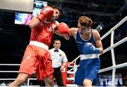 21 October 2013; Michael Conlan, right, St. John Bosco BC, Belfast, representing Ireland, exchanges punches with Brian Gonzalez, Mexico, during their Men's Bantamweight 56Kg Last 16 bout. AIBA World Boxing Championships Almaty 2013, Almaty, Kazakhstan. Photo by Sportsfile