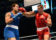 21 October 2013; Thomas McCarthy, left, Oliver Plunkett BC, Belfast, representing Ireland, exchanges punches with Emir Ahmatovic, Germany, during their Men's Heavyweight 91Kg Last 16 bout. AIBA World Boxing Championships Almaty 2013, Almaty, Kazakhstan. Photo by Sportsfile