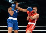 21 October 2013; Thomas McCarthy, left, Oliver Plunkett BC, Belfast, representing Ireland, exchanges punches with Emir Ahmatovic, Germany, during their Men's Heavyweight 91Kg Last 16 bout. AIBA World Boxing Championships Almaty 2013, Almaty, Kazakhstan. Photo by Sportsfile
