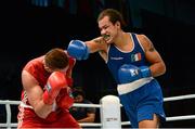 21 October 2013; Thomas McCarthy, right, Oliver Plunkett BC, Belfast, representing Ireland, exchanges punches with Emir Ahmatovic, Germany, during their Men's Heavyweight 91Kg Last 16 bout. AIBA World Boxing Championships Almaty 2013, Almaty, Kazakhstan. Photo by Sportsfile
