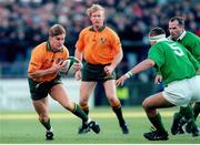 23 November 1996; Australia's Tim Horan in action against Ireland. International Friendly, Ireland v Australia, Lansdowne Road, Dublin. Picture credit: Brendan Moran / SPORTSFILE
