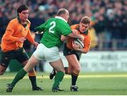 23 November 1996; Australia's Tim Horan in action against Ireland's Keith Wood. International Friendly, Ireland v Australia, Lansdowne Road, Dublin. Picture credit: Brendan Moran / SPORTSFILE