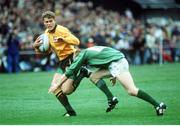 20 October 1991; Jason Little, Australia, in action against Simon Geoghan, Ireland. Rugby World Cup 1991, Quarter Final, Ireland v Australia, Lansdowne Road, Dublin. Picture credit: Ray McManus / SPORTSFILE