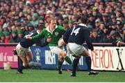 20 January 1996; Simon Geoghegan, Ireland, breaks through the Scotland tackle. Five Nations Rugby Championship, Ireland v Scotland, Lansdowne Road, Dublin. Picture credit: Brendan Moran / SPORTSFILE