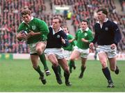 4 February 1995; Brendan Mullin, Ireland, goes past Gregor Townsend, Scotland, to score a try for his side. Five Nations Rugby Championship, Scotland v Ireland, Murrayfield, Edinburgh, Scotland. Picture credit: David Maher / SPORTSFILE