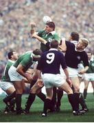12 October 1991; Ireland's Neil Francis, supported by team-mates Des Fitzgerald, left, Nick Popplwell, extreme left, and Philip Mattews, hidden, in action against Gary Armstrong, 9, and John Jeffrey, Scotland. Rugby World Cup 1991, Scotland v Ireland, Murrayfield, Scotland. Rugby. Picture credit: Ray McManus / SPORTSFILE