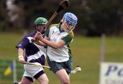 16 October 2004; Katie  McAuley, Ireland, scores a goal despite the attentions of Laura Mackay, Scotland. Ladies Camogie Shinty International, Ireland v Scotland, Rathoath GAA Club, Phairc Sean Eiffe, Co. Meath. Picture credit; Damien Eagers / SPORTSFILE