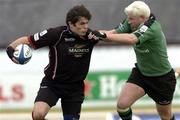 16 October 2004; Marcus Di Rollo, Edinburgh, is tackled by Mark McHugh, Connacht. Celtic League 2004-2005, Connacht v Edinburgh, Sportsground, Galway. Picture credit; Matt Browne / SPORTSFILE