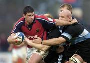 16 October 2004; Denis Leamy, Munster, in action against Craig Quinnell, right, and Martyn Williams, Cardiff Blues. Celtic League 2004-2005, Munster v Cardiff Blues, Thomond Park, Limerick. Picture credit; Brendan Moran / SPORTSFILE