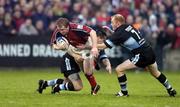 16 October 2004; Anthony Horgan, Munster, in action against Martin Jones and Martyn Williams (7), Cardiff Blues. Celtic League 2004-2005, Munster v Cardiff Blues, Thomond Park, Limerick. Picture credit; Brendan Moran / SPORTSFILE
