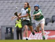 17 October 2004; Annette McGeeney, Ireland, in action against Roisin O'Neill, Britain. 2004 Coca Cola International Camogie Competition Final, Ireland v Britain, Croke Park, Dublin. Picture credit; Brian Lawless / SPORTSFILE