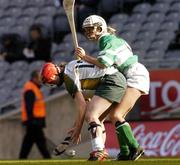 17 October 2004; Caitroina Ryan, Ireland, in action against Grainne Small, Britain. 2004 Coca Cola International Camogie Competition Final, Ireland v Britain, Croke Park, Dublin. Picture credit; Brian Lawless / SPORTSFILE