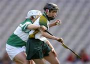 17 October 2004; Catherine Doherty, Ireland, in action against Katie Forde, Britain. 2004 Coca Cola International Camogie Competition Final, Ireland v Britain, Croke Park, Dublin. Picture credit; Brendan Moran / SPORTSFILE
