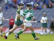 17 October 2004; Anne Marie O'Dwyer, Britain, in action against Yvonne Carney, Ireland. 2004 Coca Cola International Camogie Competition Final, Ireland v Britain, Croke Park, Dublin. Picture credit; Brendan Moran / SPORTSFILE