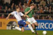 13 October 2004; Gary Doherty, Republic of Ireland, in action against Julian Johnsson, Faroe Islands. FIFA 2006 World Cup Qualifier, Republic of Ireland v Faroe Islands, Lansdowne Road, Dublin. Picture credit; Brian Lawless / SPORTSFILE