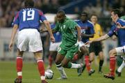9 October 2004; Clinton Morrison, Republic of Ireland, in action against Gael Gives (19) and Sebastien Squillaci, France. FIFA World Cup 2006 Qualifier, France v Republic of Ireland, Stade de France, Paris, France. Picture credit; Brendan Moran / SPORTSFILE