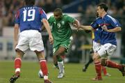9 October 2004; Clinton Morrison, Republic of Ireland, in action against Gael Gives (19) and Sebastien Squillaci, France. FIFA World Cup 2006 Qualifier, France v Republic of Ireland, Stade de France, Paris, France. Picture credit; Brendan Moran / SPORTSFILE